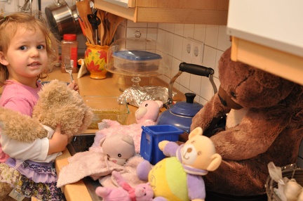 whole bear family helping to cook